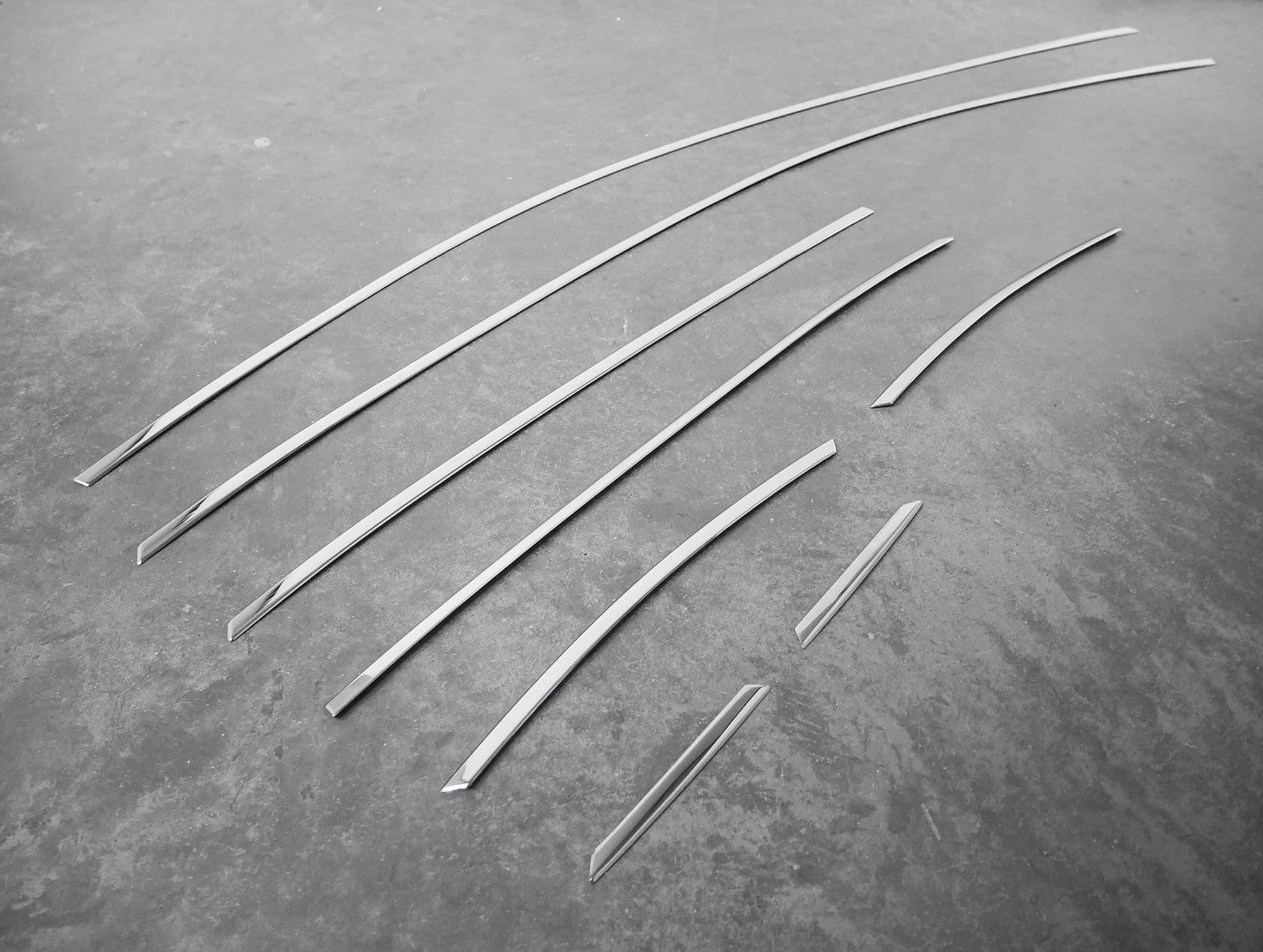 Trims above side windows — Chrome, Stainless steel, Polished