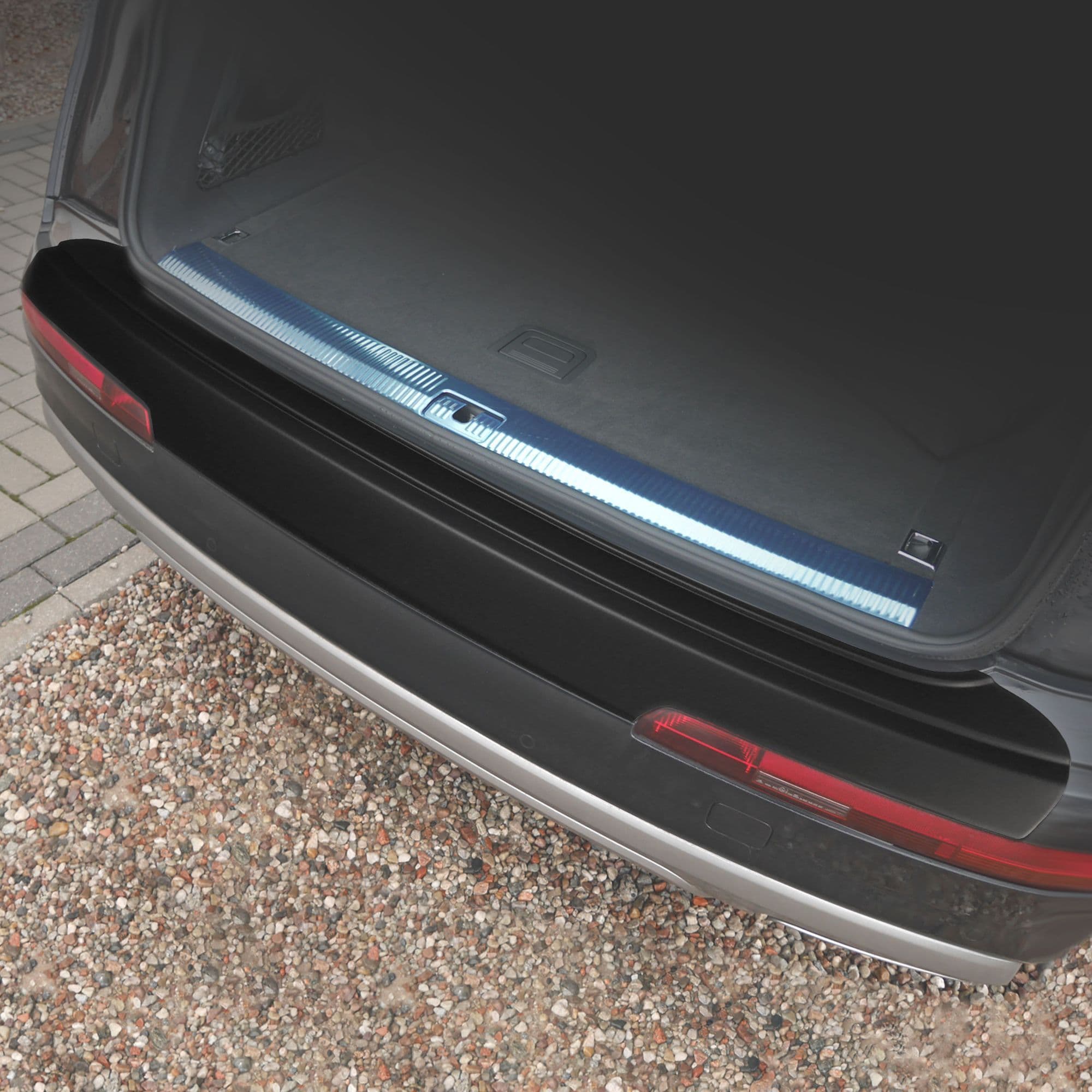 Rear bumper trim — Black, ABS plastic, Matte