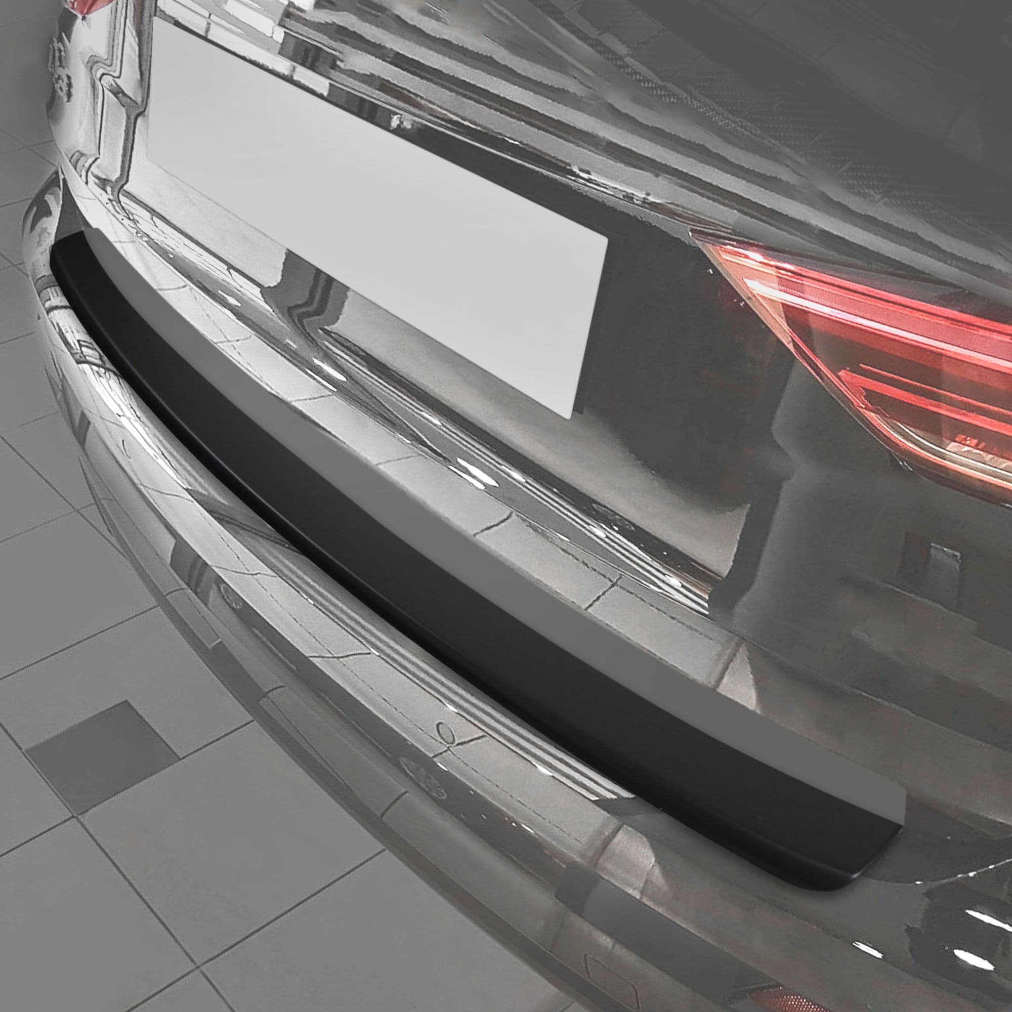 Rear bumper trim — Black, ABS plastic, Matte