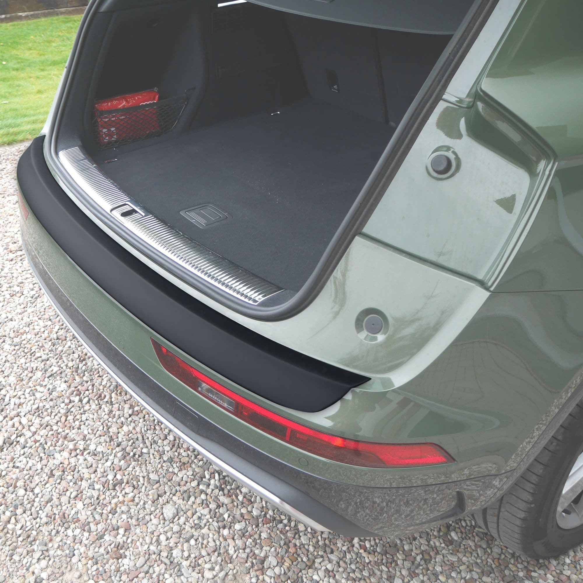 Rear bumper trim — Black, ABS plastic, Matte
