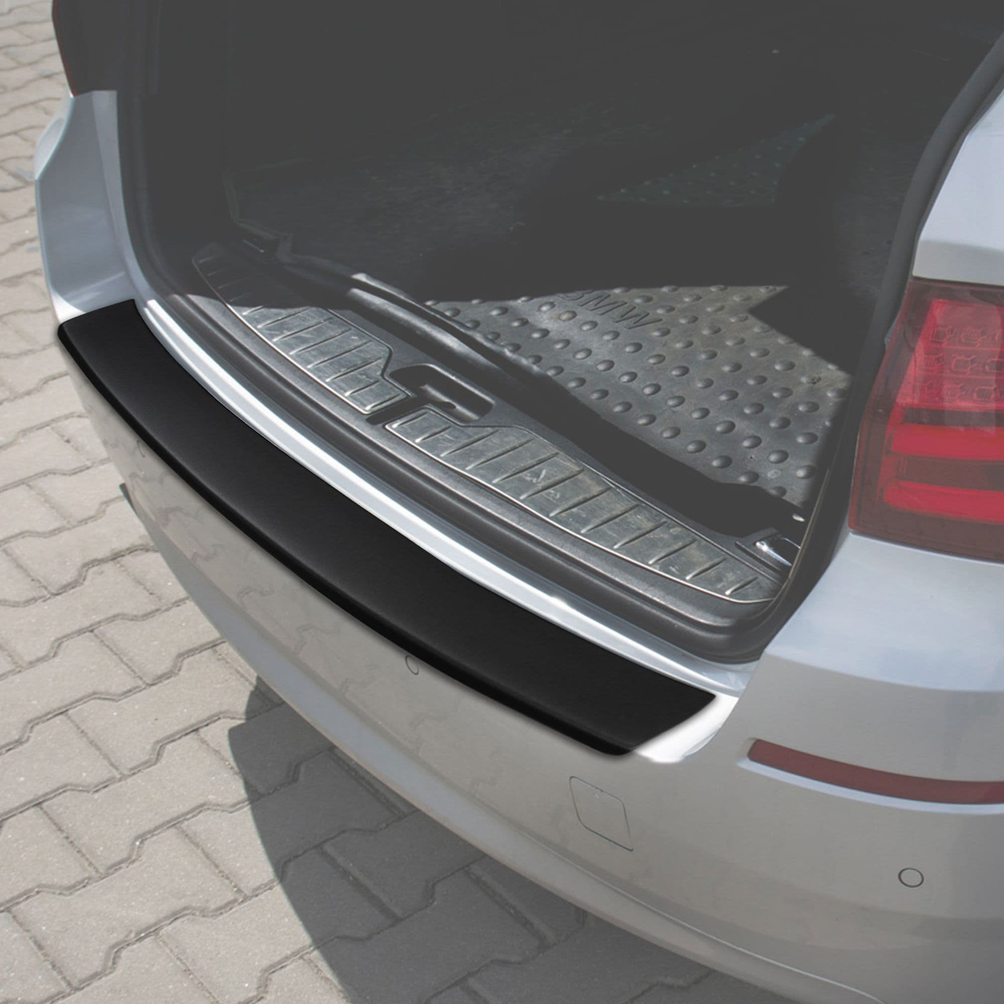 Rear bumper trim — Black, ABS plastic, Matte